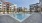 a swimming pool between apartment buildings