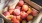 a crate full of peaches