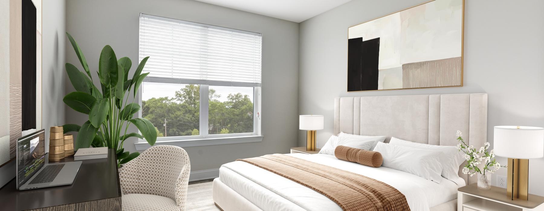 a bedroom with a bed and a plant