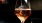 a glass of wine being poured