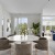 a dining room with a table and chairs